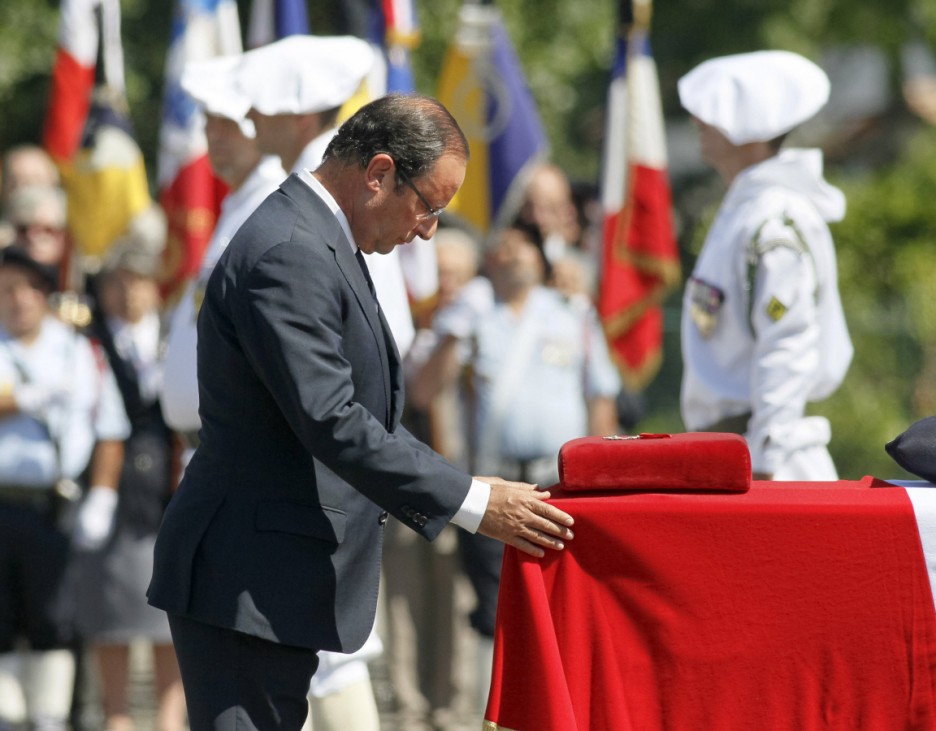 France's President Hollande pays homage to Major Bouzet at the 93rd regiment of Artillery in Varces