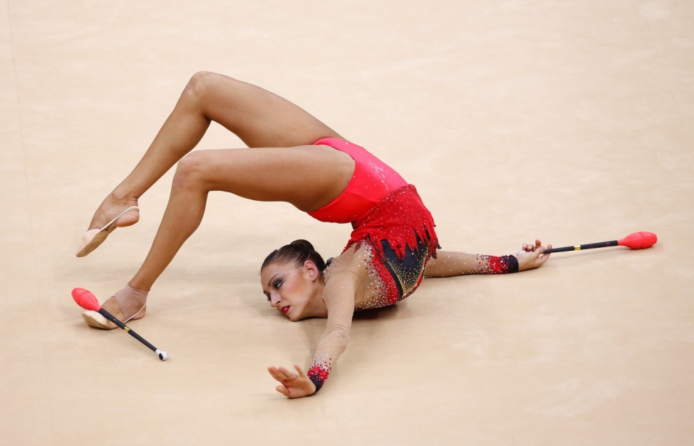 Russia's Evgeniya Kanaeva competes using the clubs in their individual all-around gymnastics final match at the Wembley Arena during the London 2012 Olympic Games