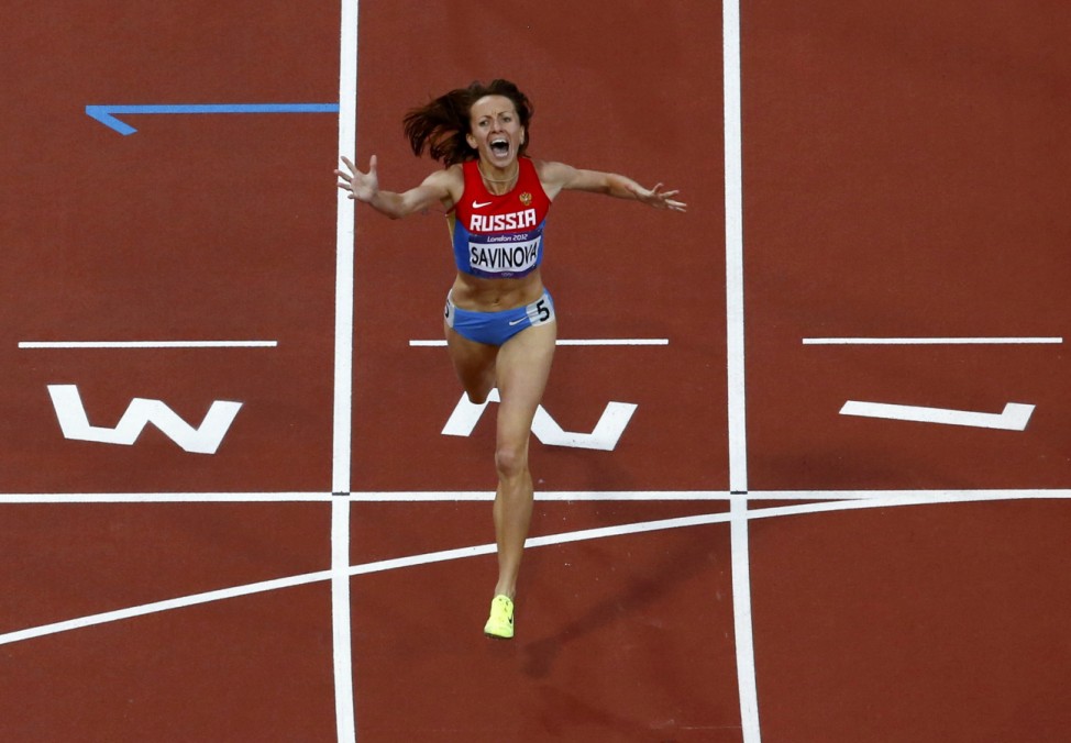 Russia's Mariya Savinova reacts as she crosses the finish line to win the women's 800m final at the London 2012 Olympic Games