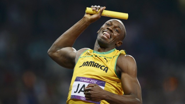 Jamaica's Usain Bolt celebrates after he won gold in the men's 4x100m relay final at the London 2012 Olympic Games