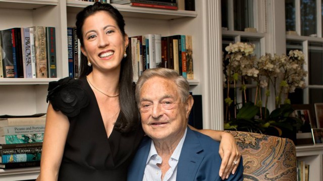 Billionaire investor George Soros and girlfriend Tamiko Bolton are pictured at Soros' residence in Southampton, New York