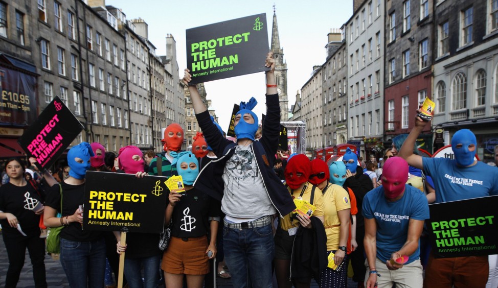 Protesters take part in Amnesty International flash mob demonstration in support of Russian punk band Pussy Riot in Edinburgh