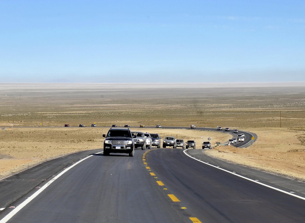 The Bolivian Presidential caravan is seen on a new highway near the Uyuni Salt Flats