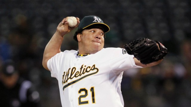 Oakland Athletics' Colon delivers a pitch during their MLB baseball game against the Toronto Blue Jays in Oakland