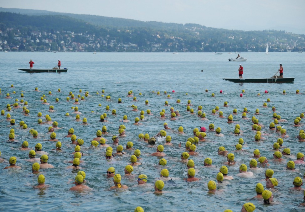 Swimmers in  Lake Zurich, during the occasion of the tradional la
