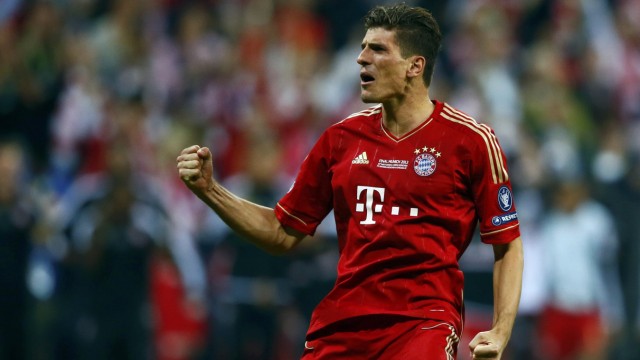 Gomez of Bayern Munich reacts after scoring a penalty against Chelsea during their Champions League final soccer match at the Allianz Arena in Munich
