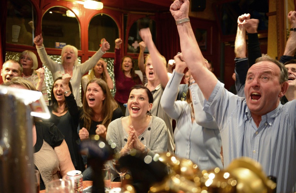 Fans of tennis player Andy Murray react as he wins his US Open mens singles final match in Dunblane, Scotland