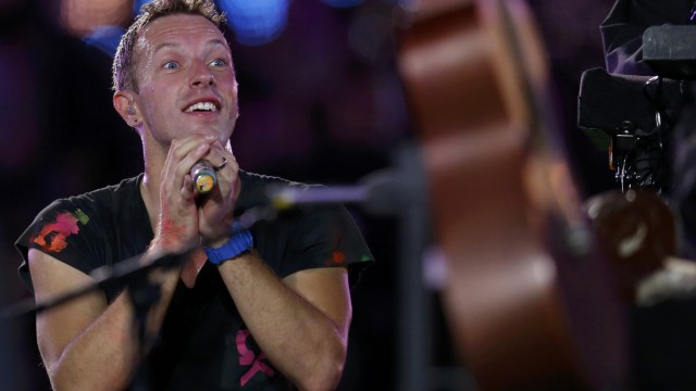 Chris Martin performs with his band Coldplay in the Olympic Stadium during the closing ceremony of the London 2012 Paralympic Games