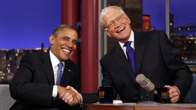 Seated with talk show host David Letterman, U.S. President Barack Obama makes an appearance on the 'Late Show with David Letterman' at the Ed Sullivan Theater in New York City
