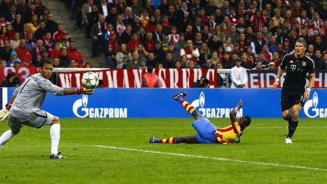 Bayern Munich's Bastian Schweinsteiger scores a goal against Valencia's goalkeeper Diego Alves during their Champions League Group F soccer match in Munich