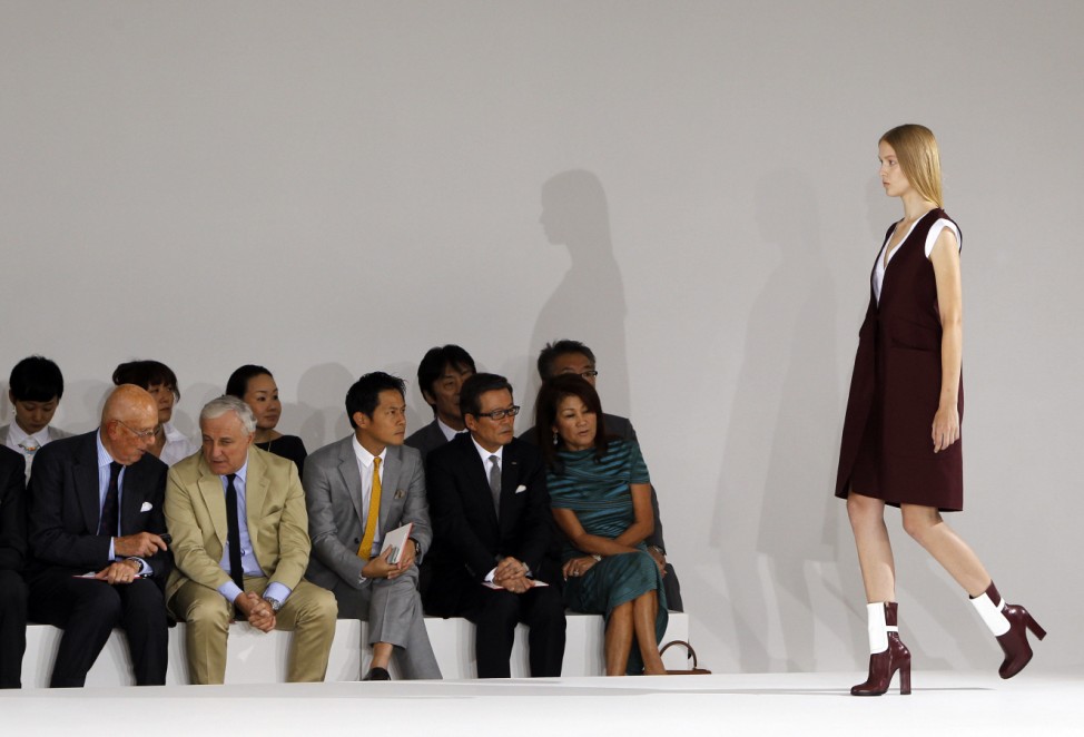 A model presents a creation from the Jil Sander Spring/Summer 2013 collection at Milan Fashion Week