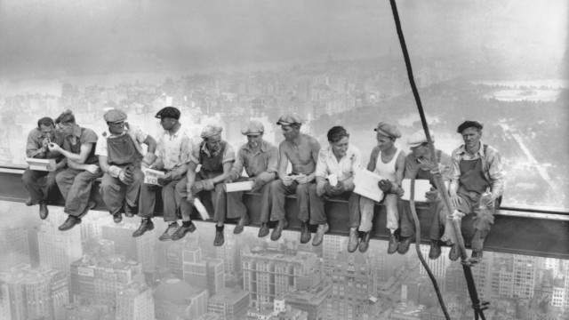 Construction workers eat their lunch atop the RCA Building in New York
