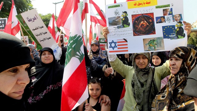 Supporters of Hezbollah and other Lebanese national parties prote