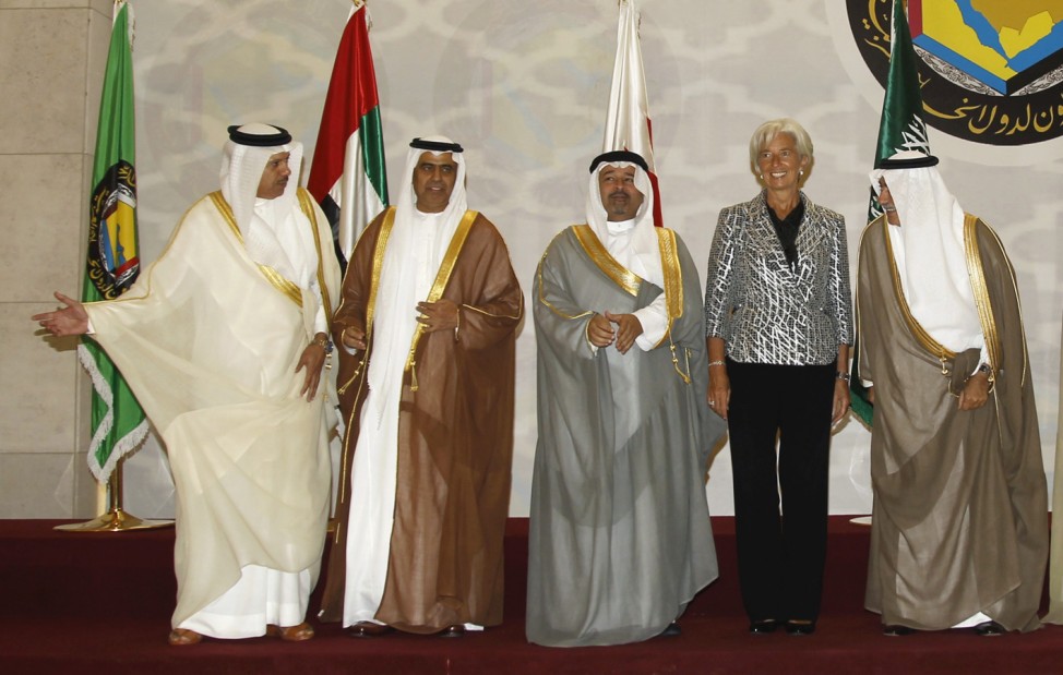 Al-Zayani Al Tayer Al Khalifa Lagarde and al-Assaf pose before Gulf Cooperation Council Finance Ministers meeting in Riyadh