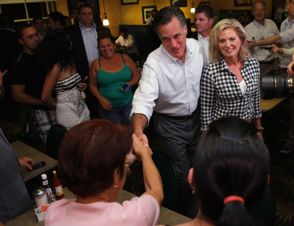 Republican presidential nominee Romney and wife Ann greet diners during a visit to La Tersesita Restaurant in Tampa