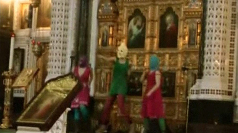 File still image of members female punk band 'Pussy Riot' staging a protest inside Christ The Saviour Cathedral in Moscow