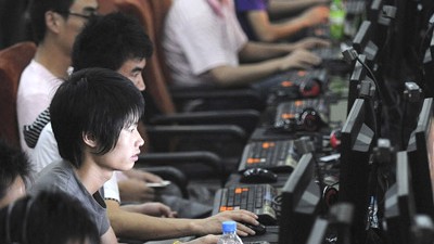 Internet in China: Internet-Café in China: Geld für Spitzeldienste