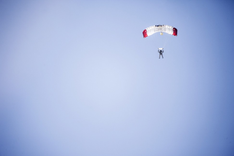 Handout photo of pilot Felix Baumgartner of Austria landing after successfully completing the final manned flight for Red Bull Stratos in Roswell