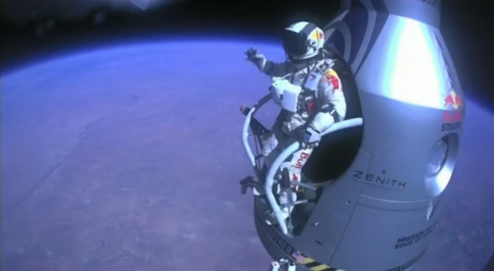 Handout of pilot Felix Baumgartner of Austria exiting his capsule as he begins his record-setting skydive over Roswell