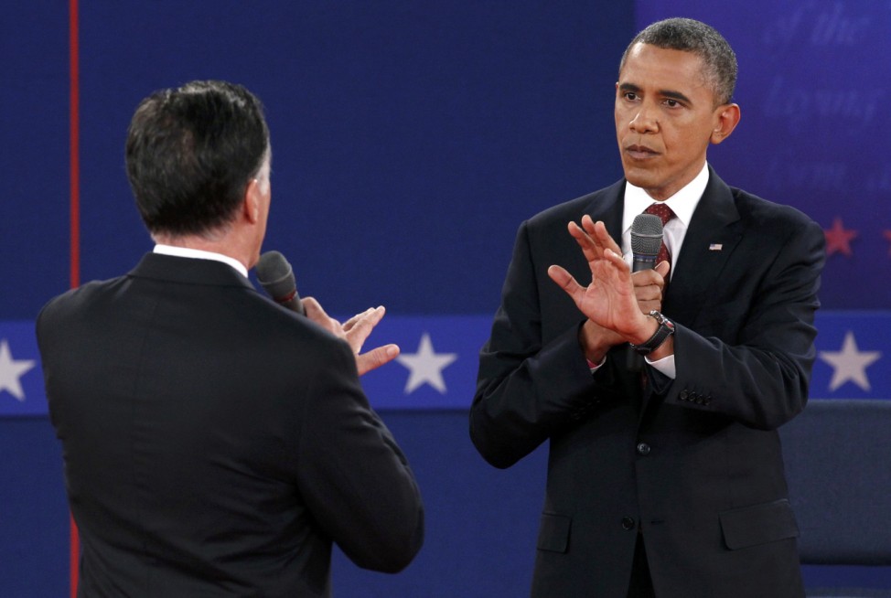 Republican presidential nominee Romney and U.S. President Obama speak directly to each other during the second U.S. presidential campaign debate in Hempstead