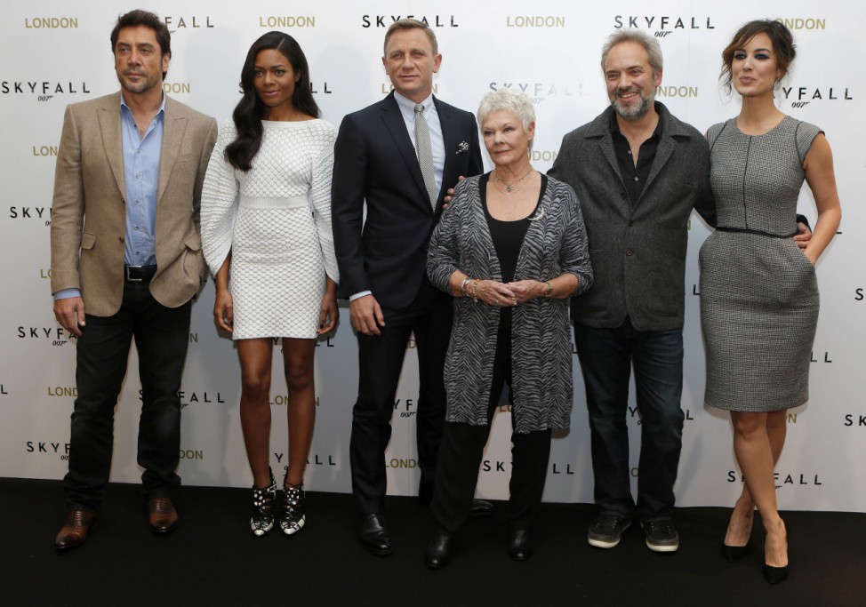Actors Bardem, Harris, Craig, Dench, director Mendes, and actor Marlohe pose during a photocall to promote the new James Bond film 'Skyfall', in central London