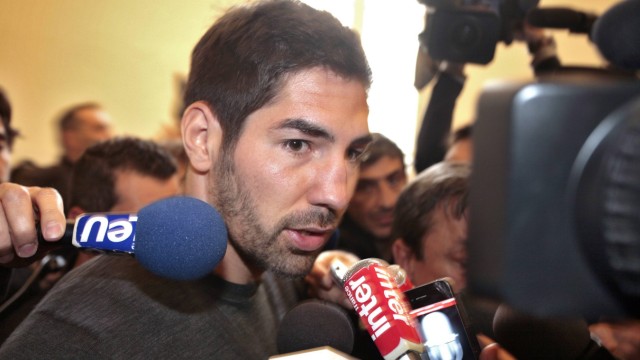 Montpellier's handball player Nikola Karabatic speaks to the media after a hearing as part of an investigation into an alleged match-fixing scandal at the Montpellier's courthouse