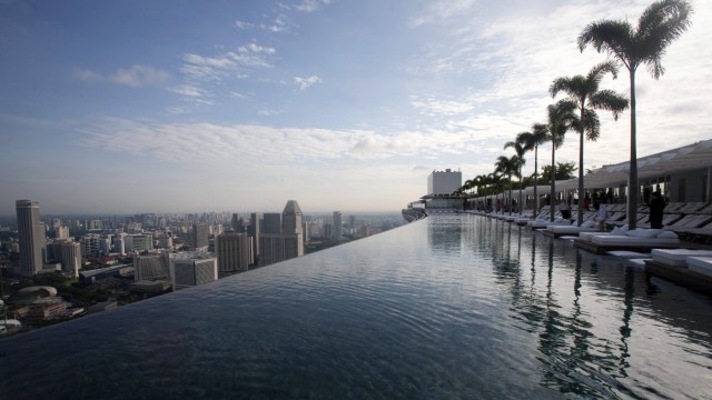 A view of the infinity pool of the Skypark that tops the Marina Bay Sands hotel towers in Singapore