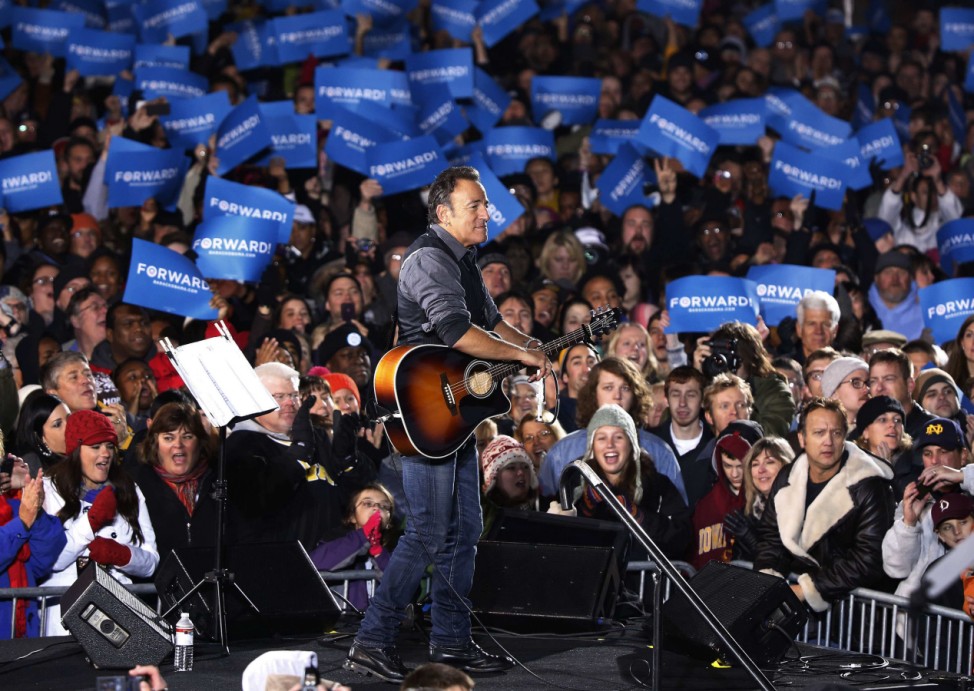 Singer Bruce Springsteen performs in honor of U.S. President Barack Obama on the president's last night of campaigning, in Des Moines, Iowa