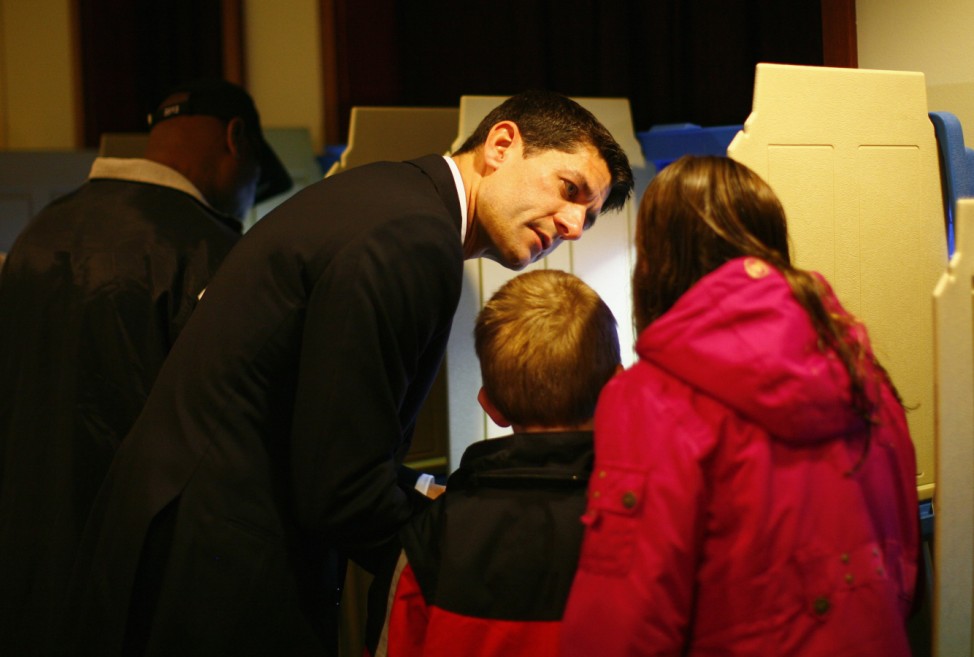 Republican vice presidential candidate Ryan and wife Janna vote during U.S. Presidential election accompanied by their children in Janesville