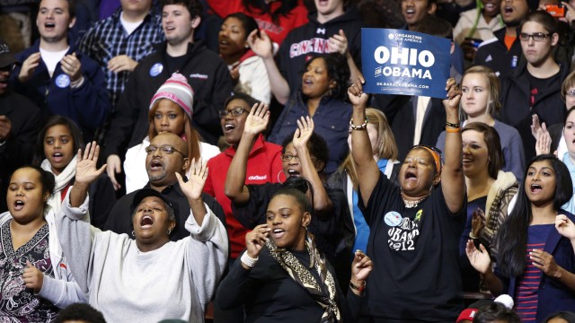 Crowd dances to Stevie Wonder at the University of Cincinnati during campaign event