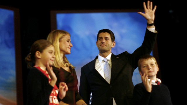 Republican vice presidential candidate Paul Ryan and his wife Janna wave to supporters during his election night rally in Boston