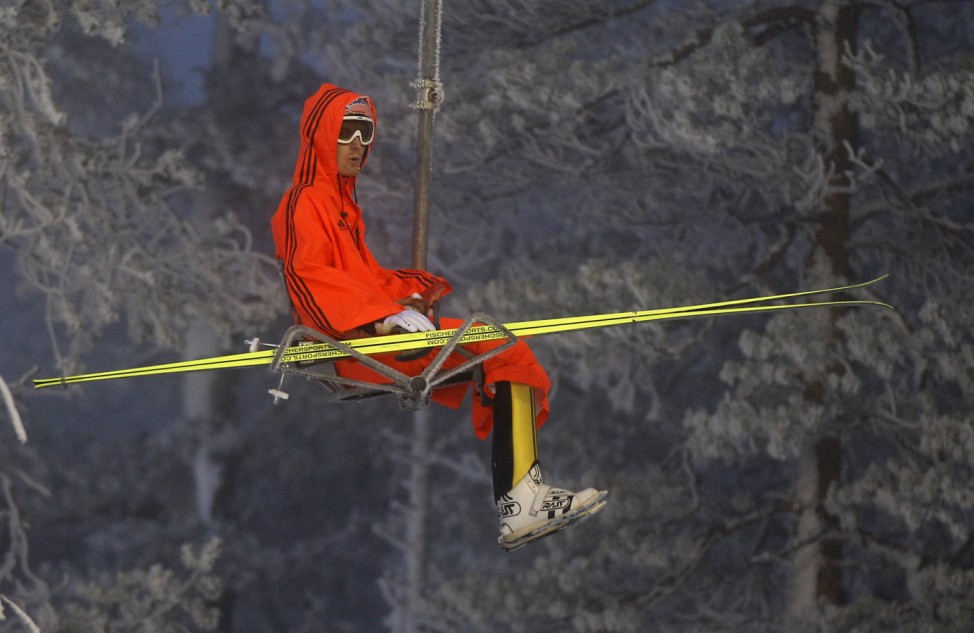 Germany's Freund sits in a chairlift during the World Cup large hill ski jumping event at Ruka ski resort near Kuusamo