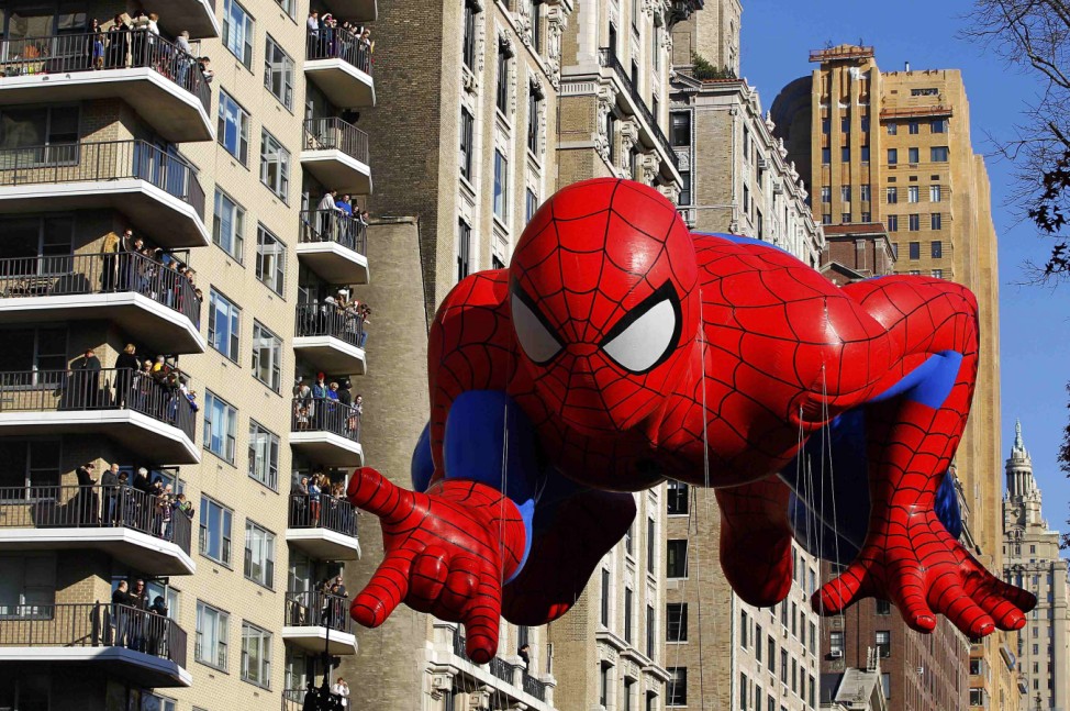 The Spiderman balloon floats down Central Park West during the 86th Macy's Thanksgiving Day Parade in New York