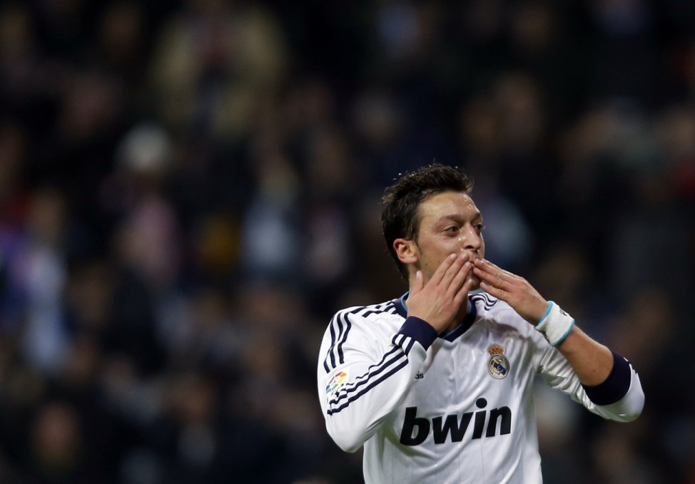Real Madrid's Ozil celebrates goal against Athletic Bilbao during Spanish First Division soccer match in Madrid