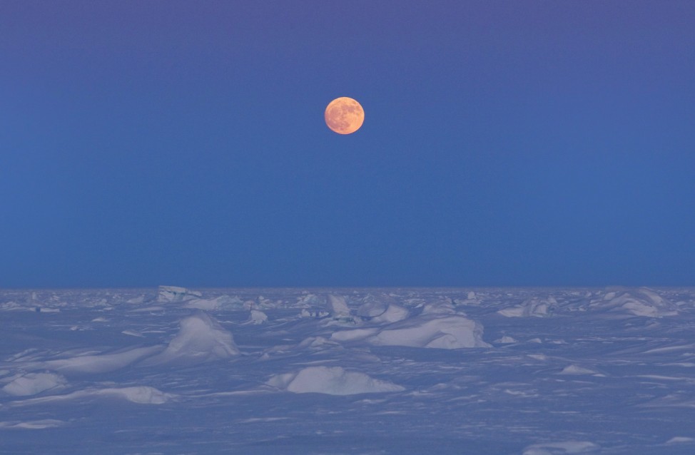 The moon rises over Arctic ice near the 2011 Applied Physics Laboratory Ice Station north of Prudhoe Bay, Alaska