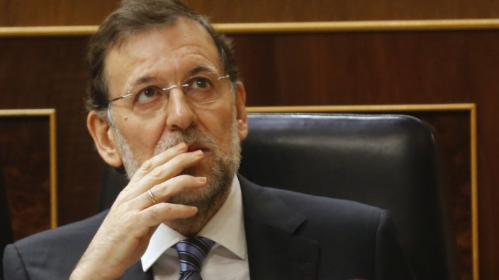 Spain's Prime Minister Mariano Rajoy attends a parliamentary session at Spanish parliament in Madrid