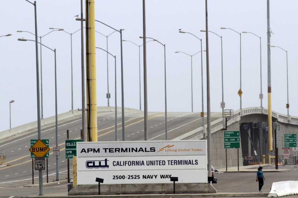 A road normally crowded with trucks is seen empty during a strike at the port in Los Angeles