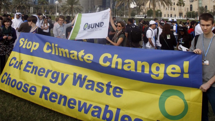Demonstranten fordern in Doha, wo der Weltklimagipfel stattfindet, mehr Einsatz im Kampf gegen die Erderwärmung.