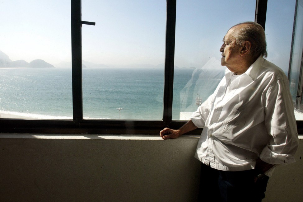 File photo of Brazilian architect Oscar Niemeyer looking at the Copacabana beach in Rio de Janeiro