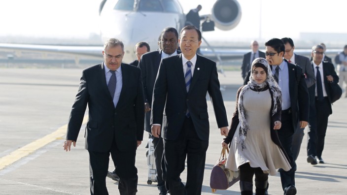 United Nations Secretary-General Ban Ki-moon  walks upon his arrival at Baghdad