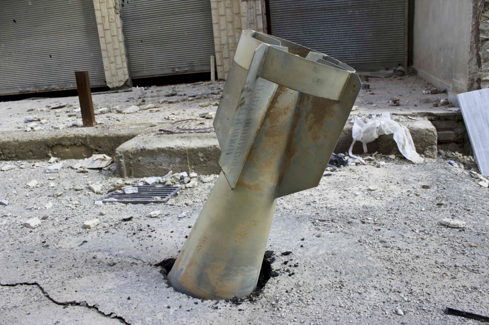 An unexploded ordnance is seen in the Ain Terma area in Ghouta, east of Damascus