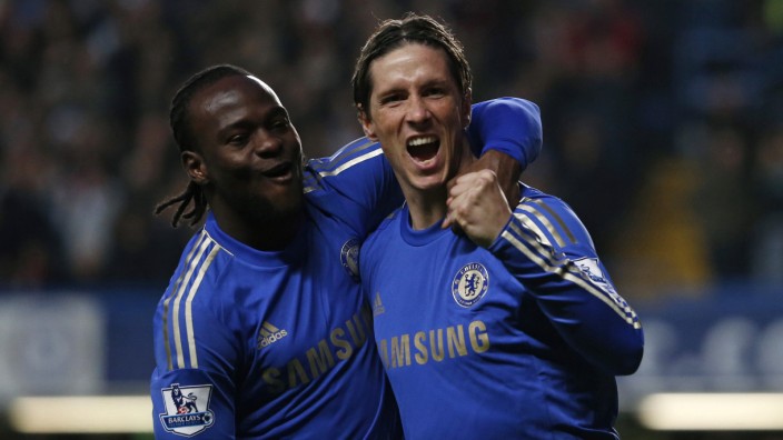 Chelsea's Torres celebrates his goal against Aston Villa with Moses during their English Premier League soccer match in London