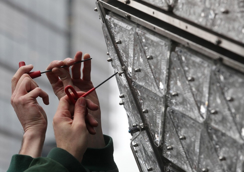 Workers Install Bulbs On Times Square New Year's Eve Ball