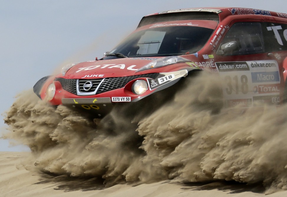 France's Lavieille and co-pilot Polato compete with their Proto Dessoude during the first stage of the Dakar Rally 2013 from Lima to Pisco