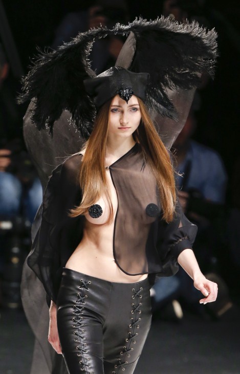 A model presents a creation by C'Est Tout at the Berlin Fashion Week Autumn/Winter 2013 in Berlin