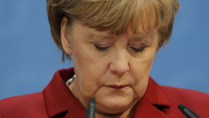 German Chancellor Merkel is pictured during a news conference at the CDU headquarters in Berlin