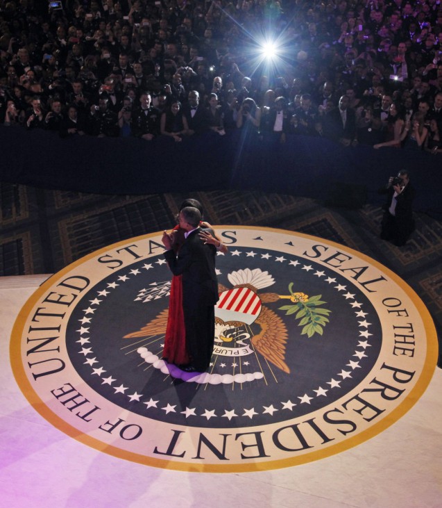 U.S. first lady Michelle Obama dances with U.S. President Barack Obama at the Commander in Chief's ball in Washington