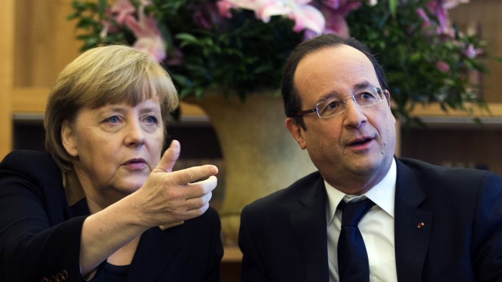 German Chancellor Merkel and French President Hollande meet French and German cultural representatives in Berlin
