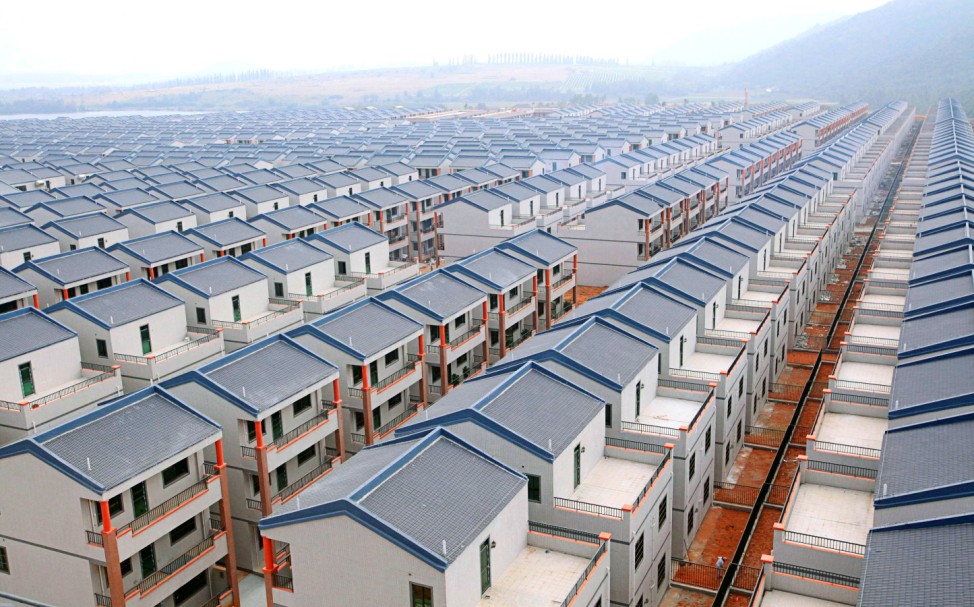 A general view of newly-built houses at Dadun village of Lingshui ethnic Li autonomous county