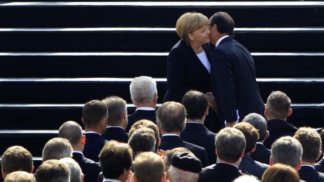 File photo of France's President Hollande and Germany's Chancellor Merkel at anniversary ceremony in castle Ludwigsburg
